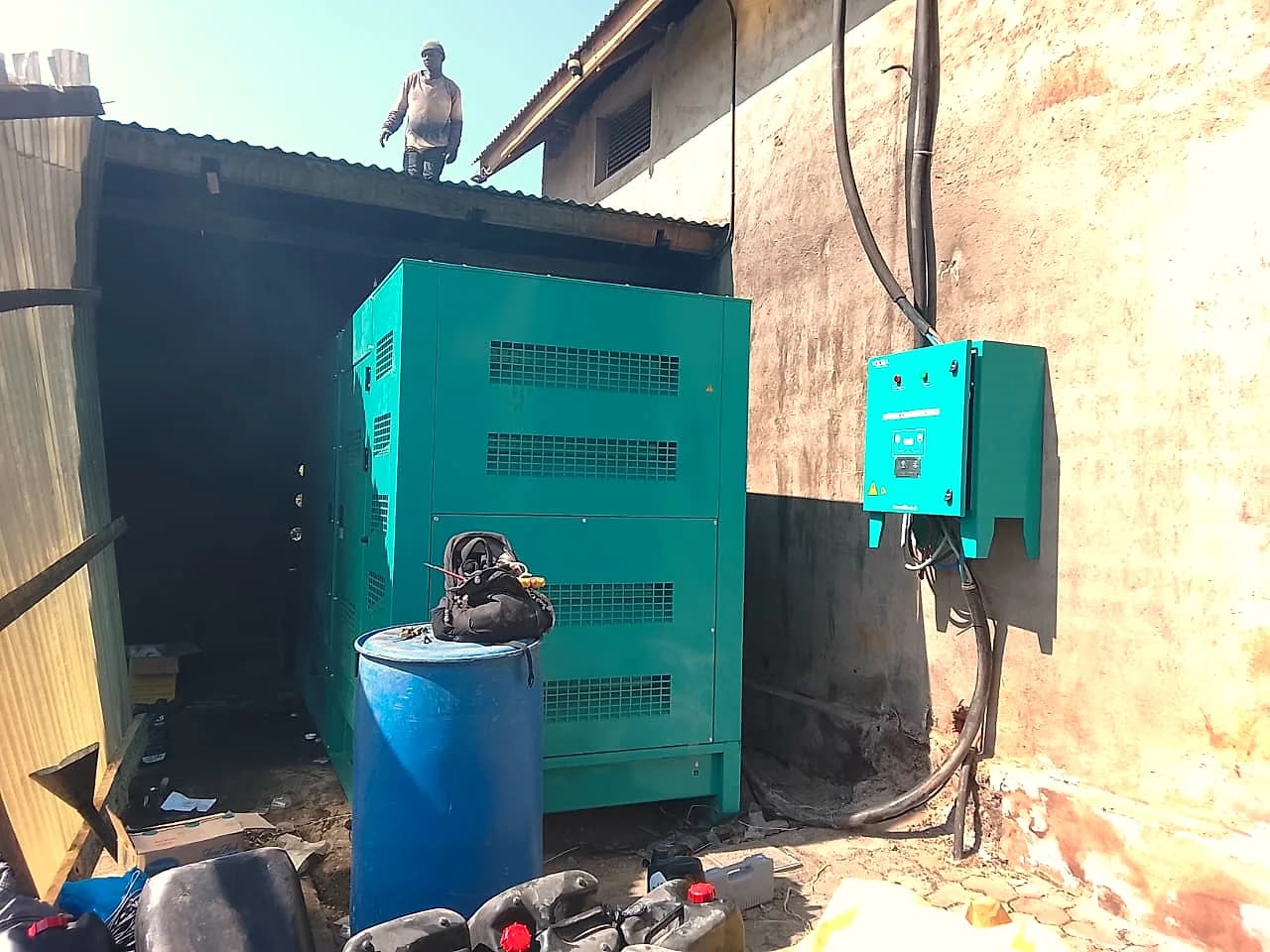 330 kVA VOLTKA generator installed on site with its changeover panel mounted on the wall
