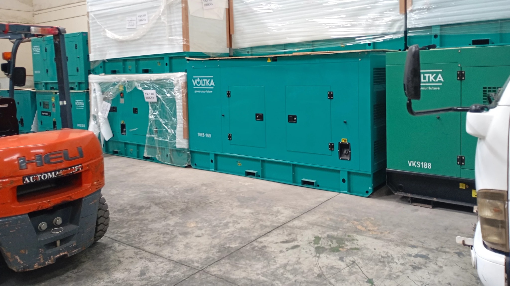 VOLTKA VKS 165 and VKS 188 generators in stock with forklift at EmersonEIMS warehouse